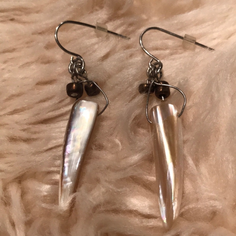 Shiny earrings with copper color beads